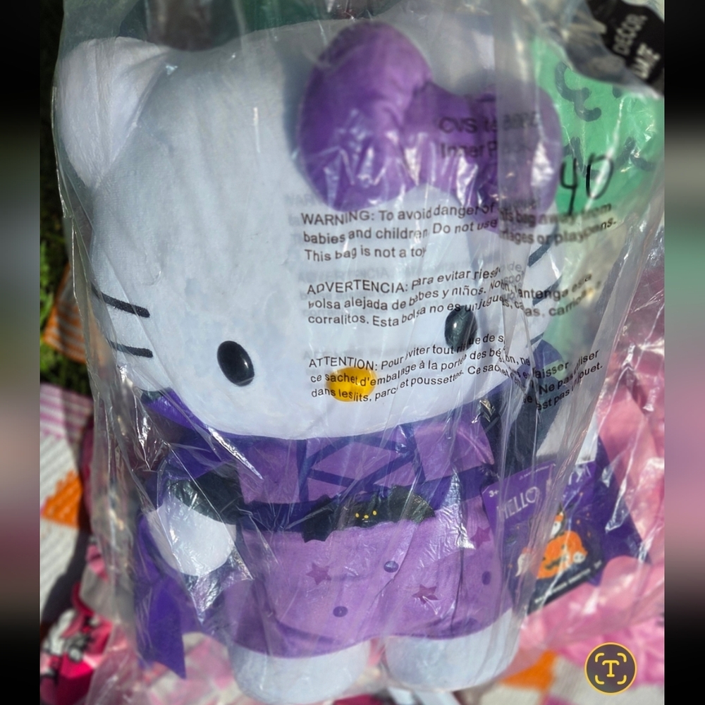 Sanrio Hello Kitty Purple and White Stuffed Animal